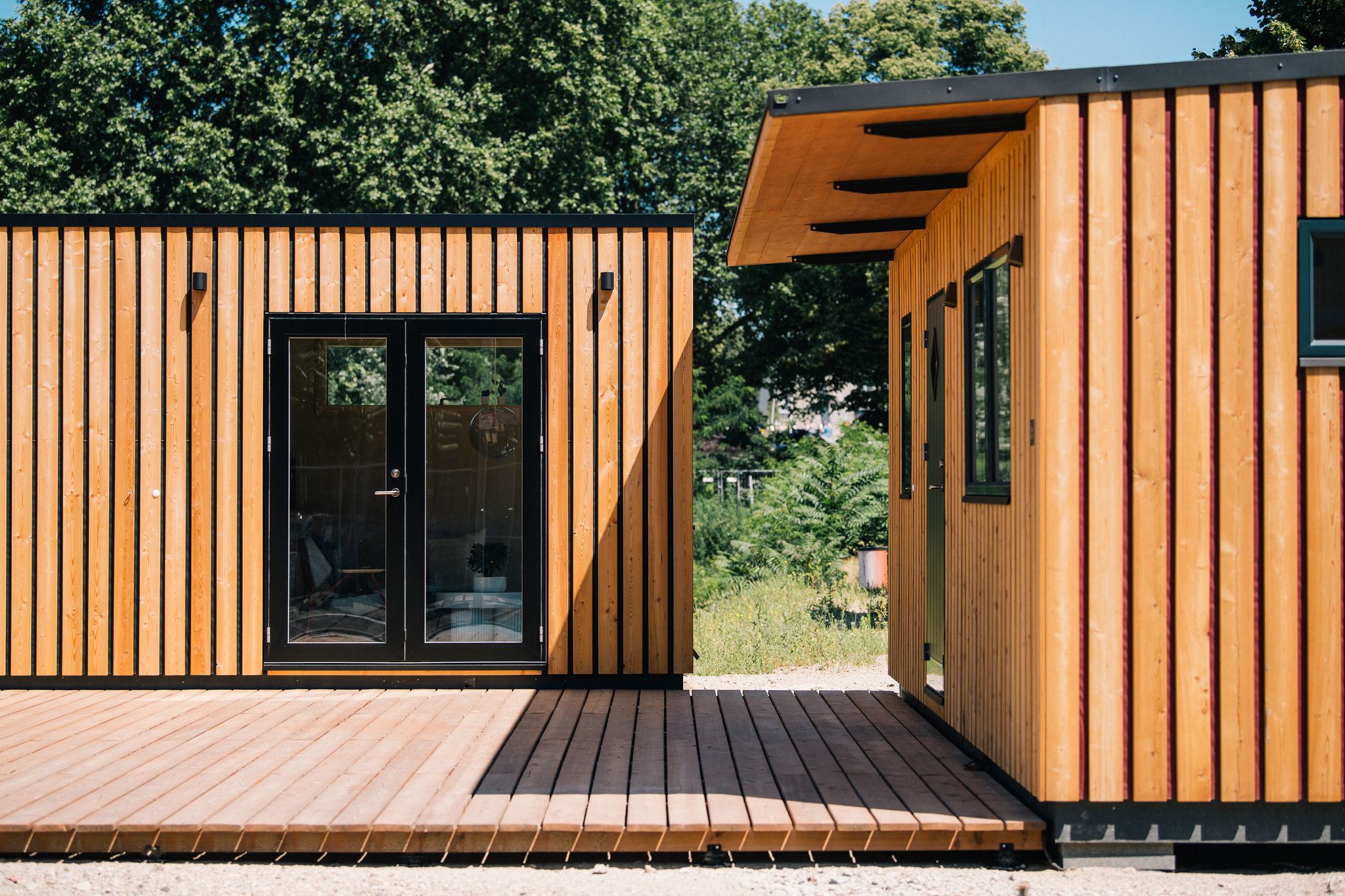 Vier Wände auf wenigen Quadratmetern: Bevor das Tiny House zum Wohntraum wird, sollten rechtliche und bauliche Fragen sorgfältig geklärt sein.