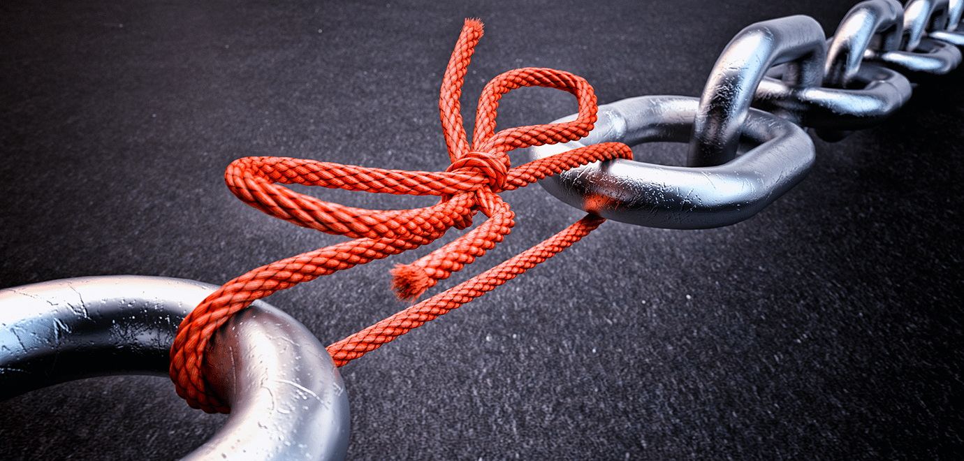 Foto: cybrain/iStock Kette von Schnüren zusammengehalten fragil